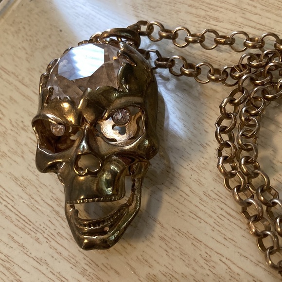 Somebody needs this gold color crystal brained scull necklace with sparkly eyes. - Picture 5 of 6